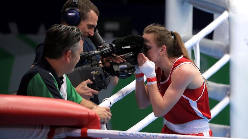 Northern Ireland’s Michaela Walsh kisses a tv camera after beating India’s Pinki Rani in the women’s flyweight semi-final at the Commonwealth Games in Glasgow. Photograph:  Peter Byrne/PA