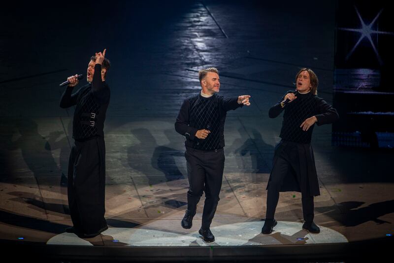 Take That's Gary Barlow, Howard Donald and Mark Owen on stage at 3Arena, Dublin. Photograph: Tom Honan