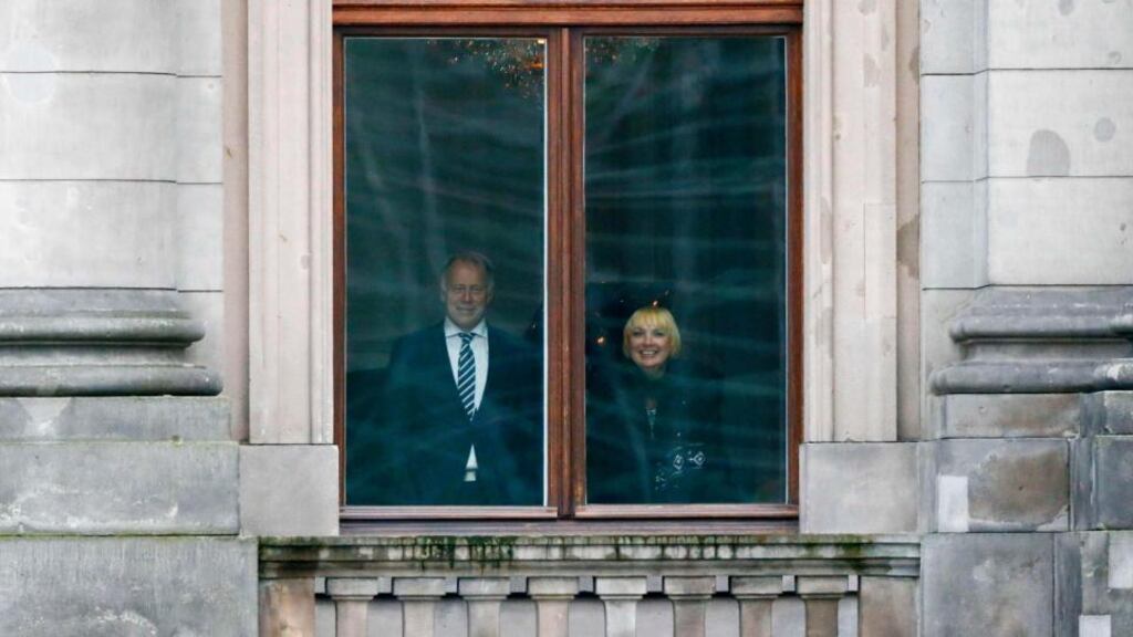 The Green Party’s Juergen Trittin and Claudia Roth look out of a window during a break in preliminary coalition talks with the CDU party in Berlin on Tuesday. Photograph: Tobias Schwarz/Reuters