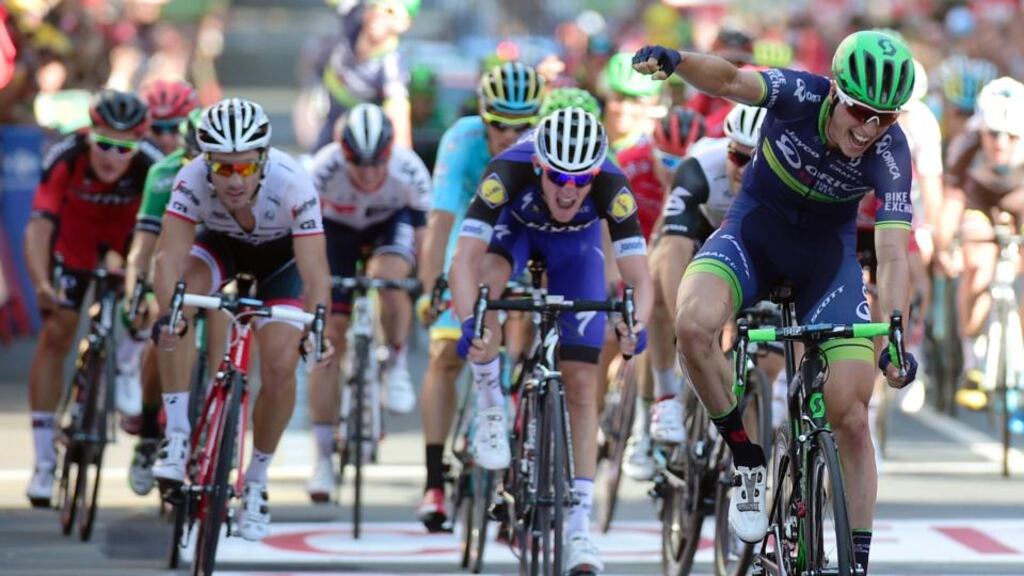 Orica Bikeexchange’s Belgian cyclist Jens Keukeleire celebrates winning as he crosses the finish line during the 12th stage of the 71st edition of “La Vuelta” Tour of Spain, a 193.2km route between Los Corrales de Buelna and Bilbao. Photo: Jose Jordan/Getty Images