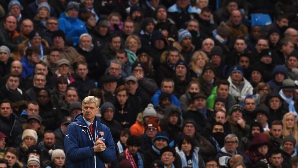 Arsenal’s French manager Arsene Wenger watches from the touchline during his side’s victory over Manchester City at the Etihad Stadium, Manchester. Photograph: AFP
