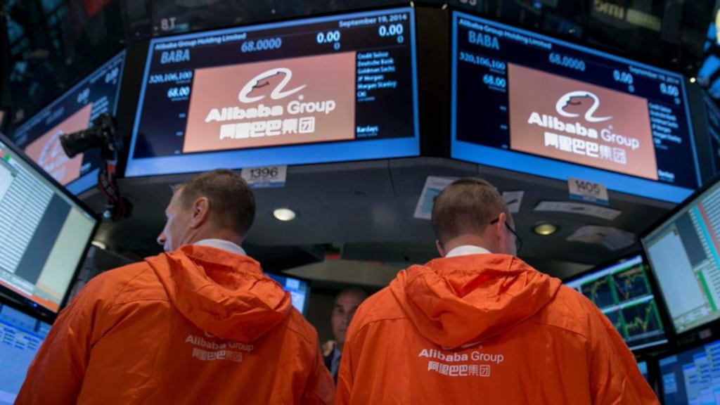 Specialist traders work at the post that trades Alibaba during the company’s initial public offering (IPO) under the ticker “BABA” at the New York Stock Exchange. Photograph: Brendan McDermid/Reuters