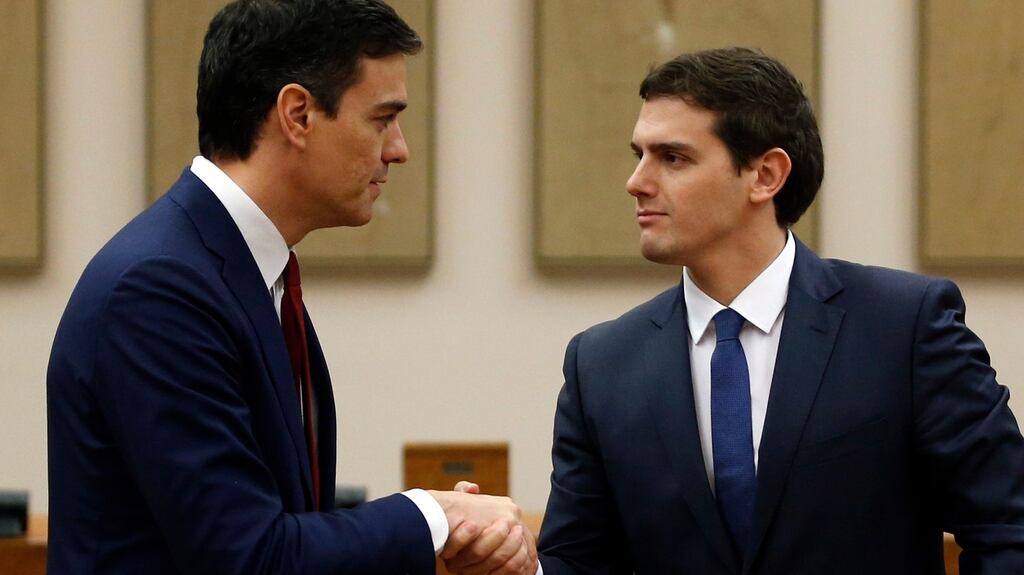 Socialist leader Pedro Sánchez (left) announcing a potential coalition agreement with Albert Rivera of Ciudadano. Photograph: Reuters/Juan Medina