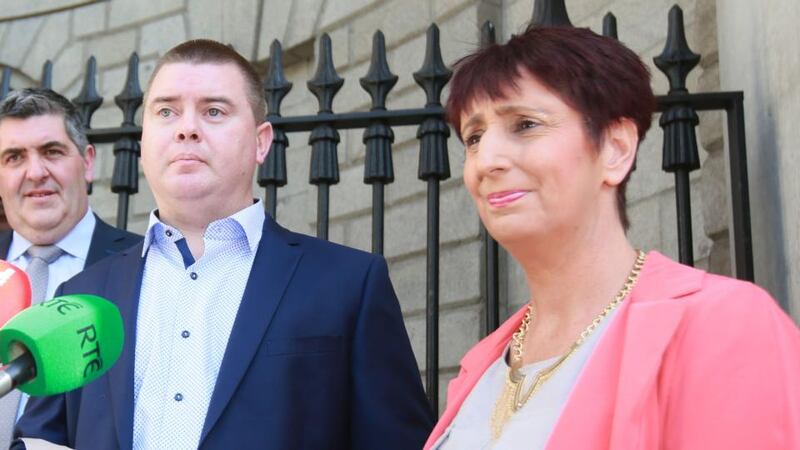 Lorraine and Raymond Brennan, of Avondale Court, Cahir, Co. Tipperary, read a statement to the media on leaving court on Thursday. Photograph: Collins
