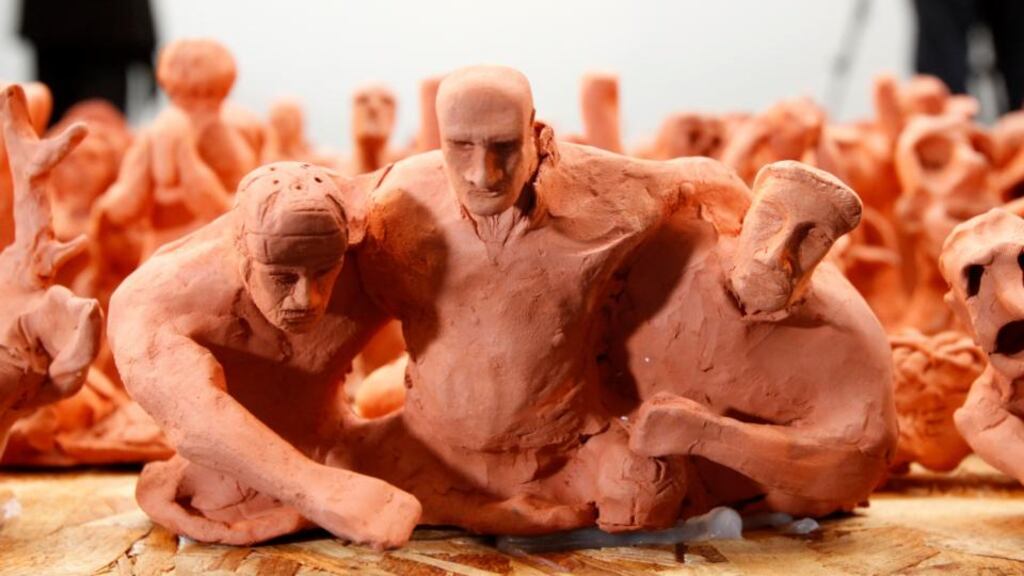 Some of the ceramic figurines that made up the Pitch for Shane art installation