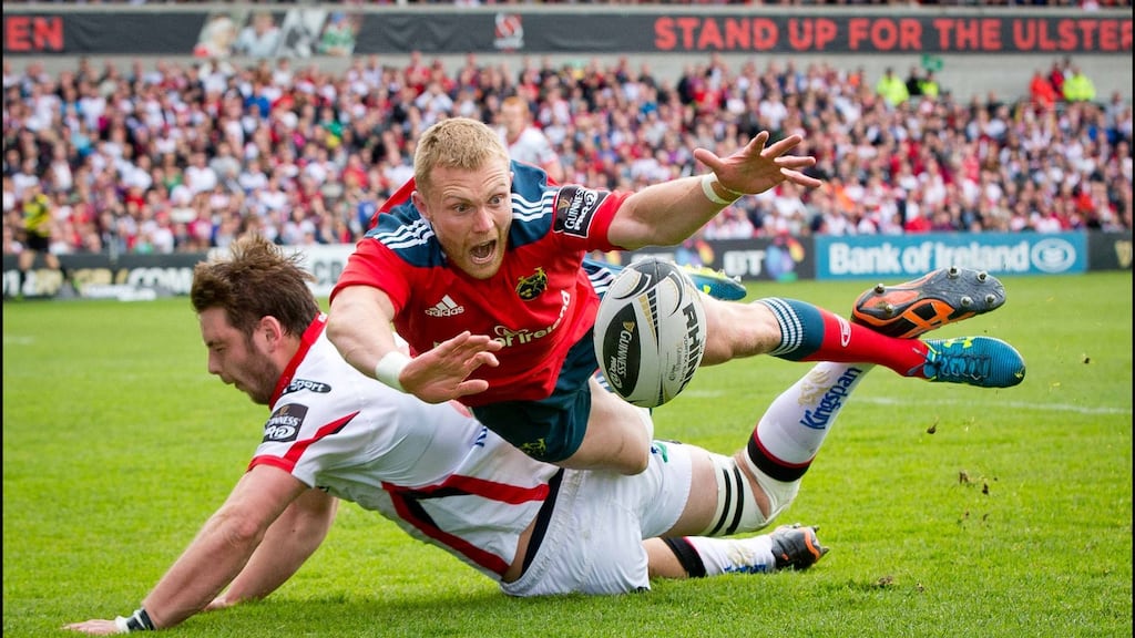 Munster’s Keith Earls battles for possession with Ulster’s Iain Henderson at the Kingspan Stadium last May. Photograph: Morgan Treacy/Inpho