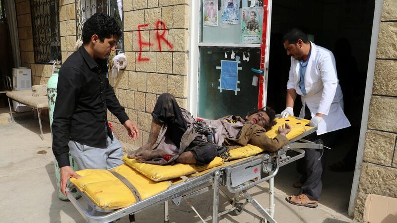 A doctor tends a boy injured by an airstrike in Sa’ada, Yemen, on Thursday. Photograph: Naif Rahma/Reuters