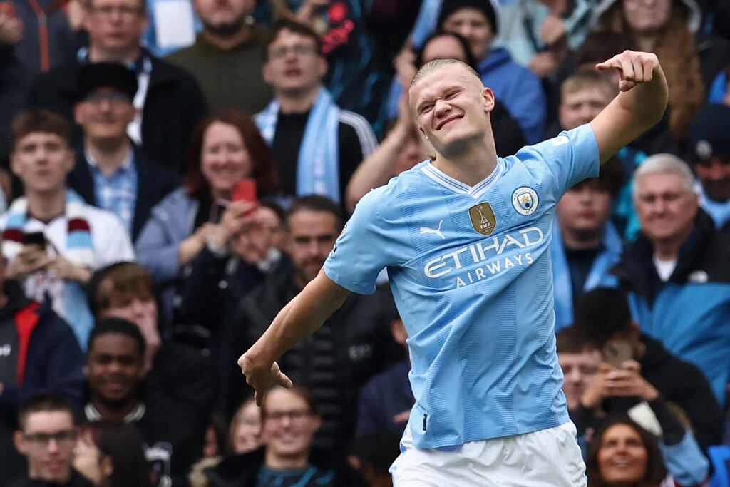 Manchester City forward Erling Haaland celebrates after scoring their third goal from the penalty spot against Luton Town at the Etihad Stadium. Photograph: Darren Staples/Getty Images