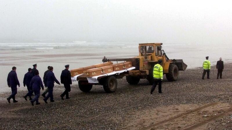 Coffins were taken along Tramore beach to the scene of the crash.Photograph: Chris Bacon/PA