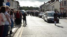 Poet laid to rest under shadow of sycamore trees