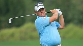 Michael Hoey four off Qatar lead