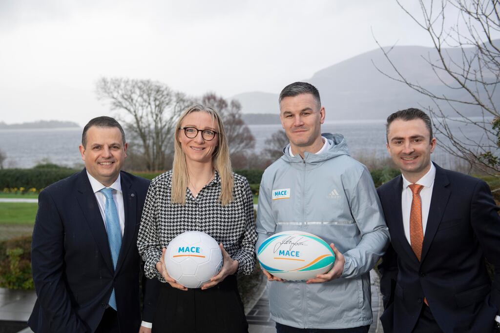Daniel O’Connell (left), retail director at BWG Foods, Louise Quinn, Ireland international soccer player, Johnny Sexton and Keith Crawford, sales director, Mace. Photograph: Don MacMonagle