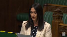 Scottish MP suspended for taking train after positive Covid test