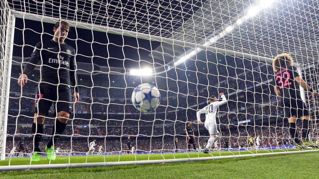 Real Madrid’s forward Jese Rodriguez celebrates with Nacho Fernandez at the Santiago Bernabeu. Photograph: Getty Images