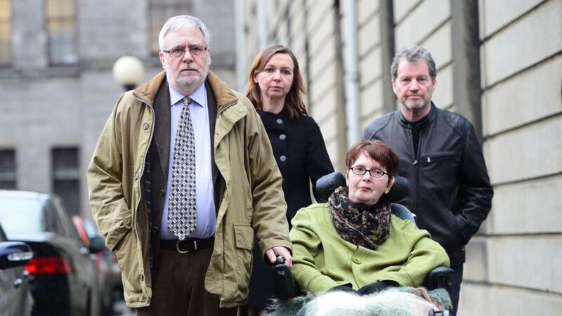 The late Marie Fleming with her partner Tom Curran (left), daughter Corrinna Moore and family friend Brendan Gainey at the High Court in January 2013. File photograph: Alan Betson/The Irish Times