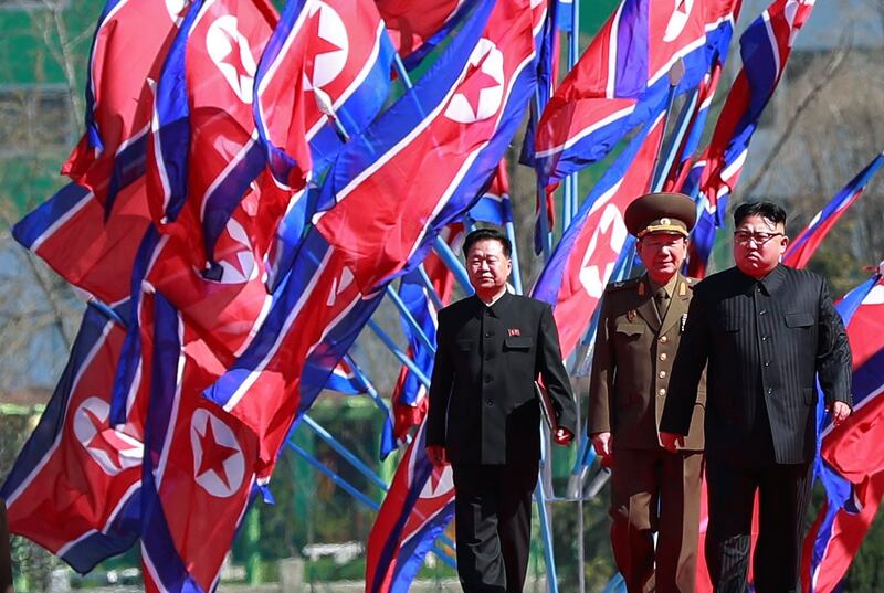 North Korean leader Kim Jong-un (far right). Washington wants Beijing to rein in the North Korean leader. Photograph: How Hwee Young/EPA