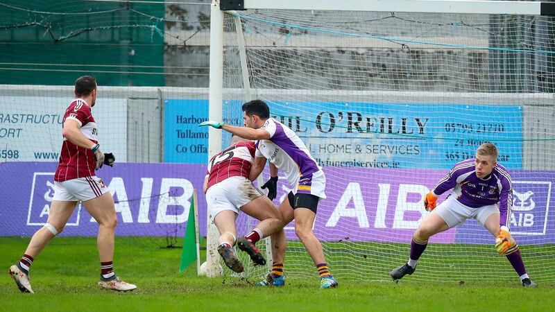 Kilmacud Crokes’ Cian O’Sullivan tackles Aidan McElligott resulting in a penalty late in the game. Photo: Oisin Keniry/Inpho