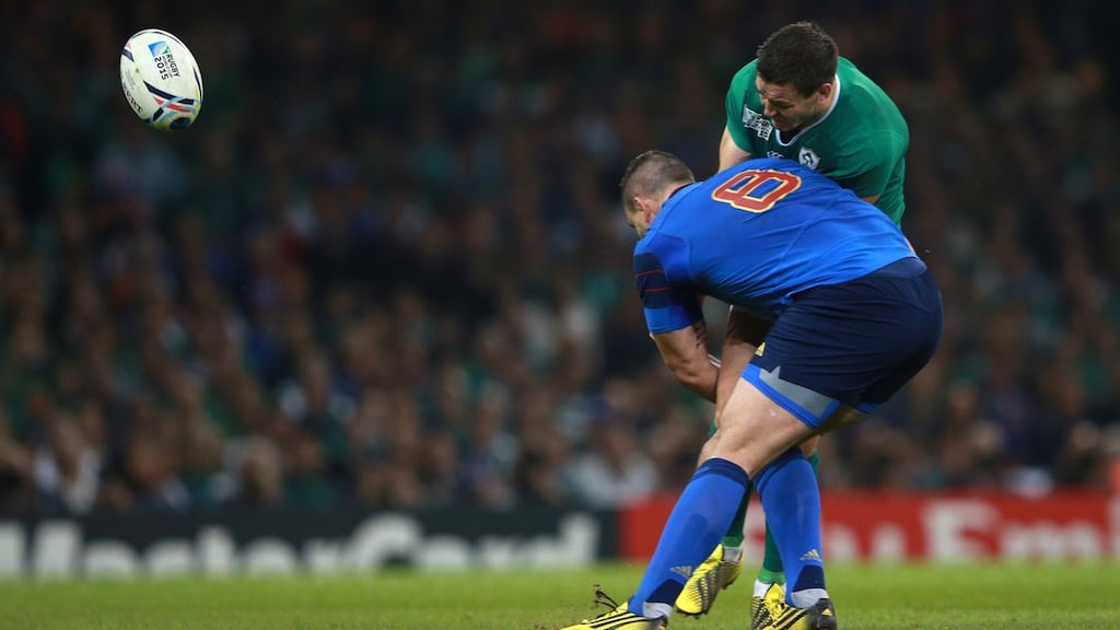 Ireland’s Jonny Sexton is tackled and injured by France’s Louis Picamoles during the recent match at the Millennium Stadium. The physical attrition in rugby is considerable. Photo: David Davies/PA