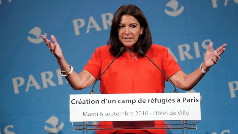 The Mayor of Paris Anne Hidalgo announces the opening of the city’s first refugee camp by mid-October. Photograph: Francois Guillot/AFP/Getty Images