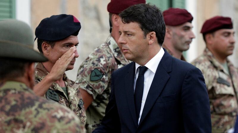 Italian prime minister Matteo Renzi arrives before a funeral service in Amatrice for victims of the earthquake. Photograph: Max Rossi/Reuters