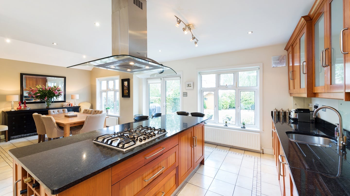 The  kitchen has been fitted with smart cherrywood units and granite worktops