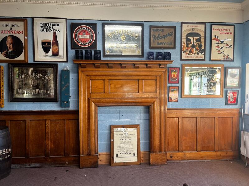 Early 20th century oak panelling and fireplace from Cannons Bar in Castlebar