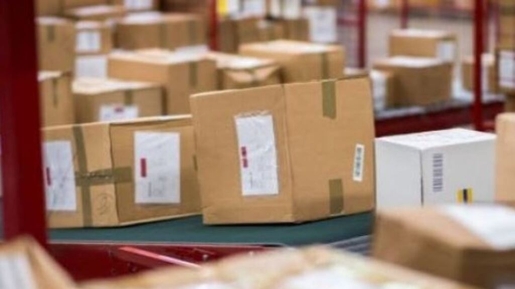 Scam artists are exploiting a surge in messages from delivery companies seeking Brexit-related taxes and charges. File photograph: Getty Images