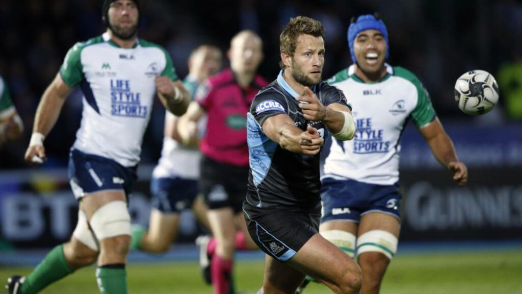 Glasgow Warriors’ Fraiser Lyle passes the ball during their Pro12 clash with Connacht. Photo: Russell Cheyne/INPHO