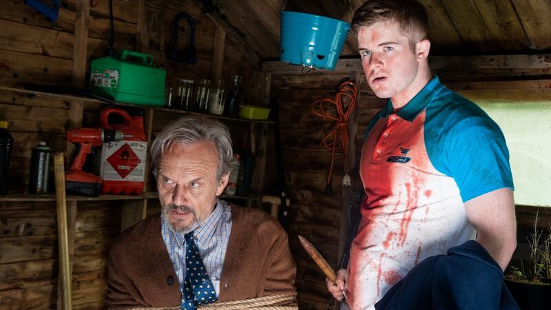 Anthony Head and Karl Rice in Let the Wrong One In