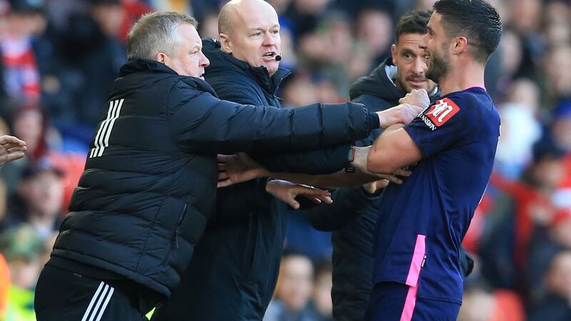 Sheffield United manager Chris Wilder clashes with Bournemouth midfielder Andrew Surman. Photograph: Lindsey Parnaby/AFP/Getty