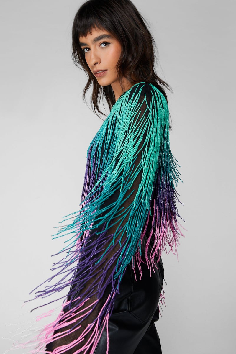 Rainbow fringe jacket, €59, Nasty Gal