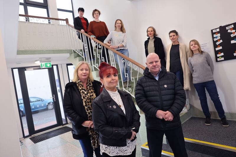 Stardust families: Louise McDermott, Fidelma Lawless and Jimmy Fitzpatrick (survivor) meet artists who have studio space in the new Artane Artists' Studio. Photograph: Dara Mac Dónaill