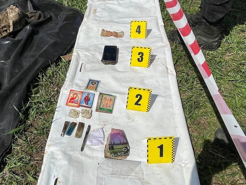Belongings found on the bodies of Russian soldiers retrieved from the battlefields of eastern Ukraine by Ukrainian volunteer group Platsdarm. Photograph: Daniel McLaughlin
