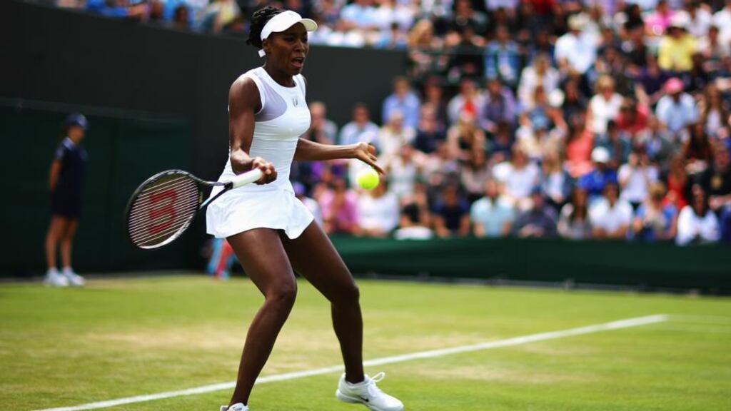 Venus Williams plays a forehand shot during her Ladies’ Singles second round match against Kurumi Nara of Japan. Photograph: Al Bello/Getty Images