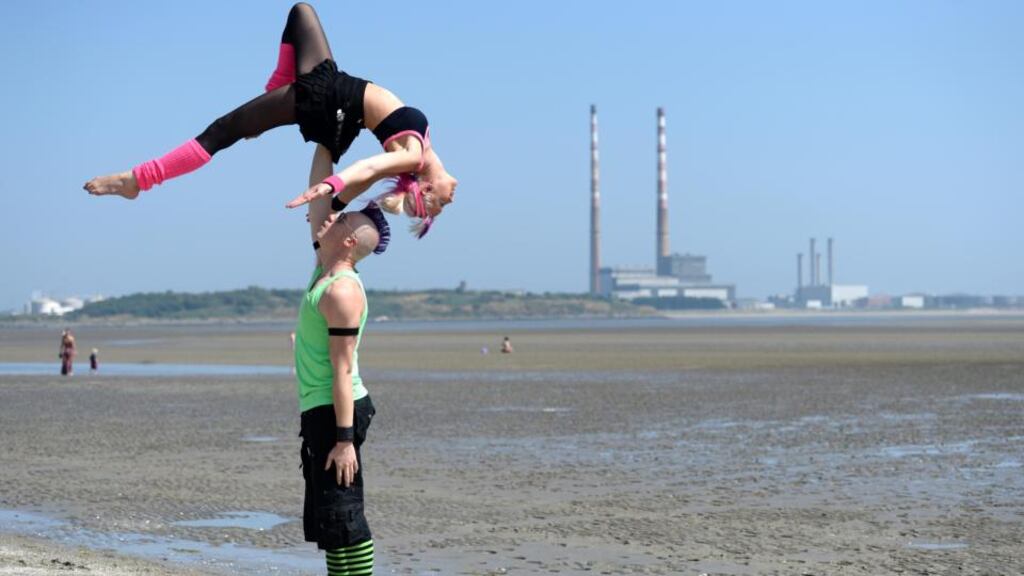 Tarrabelle and Rusty, of Zap Circus, from Australia on Sandymount Beach, Dublin as  street performers prepared to take part in championship this weekend Photograph: Dara Mac Dónaill / The Irish Times