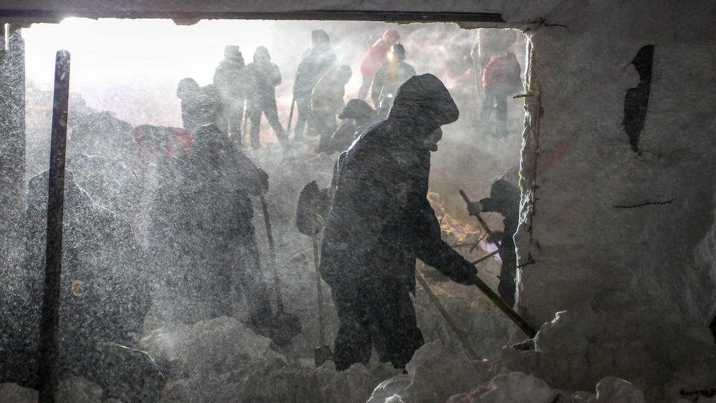 Rescuers work at an avalanche site north of Norilsk, Russia. Photograph: Irina Yarinskaya/AFP via Getty Images