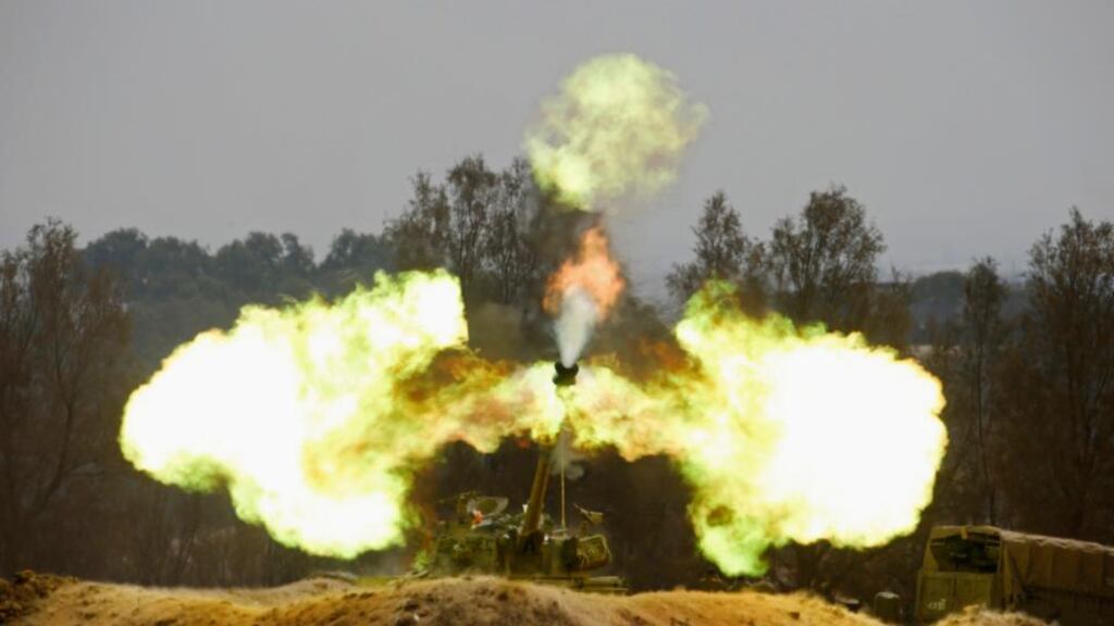 An Israeli mobile artillery unit firing towards the Gaza Strip yesterday. Photograph: Baz Ratner/Reuters