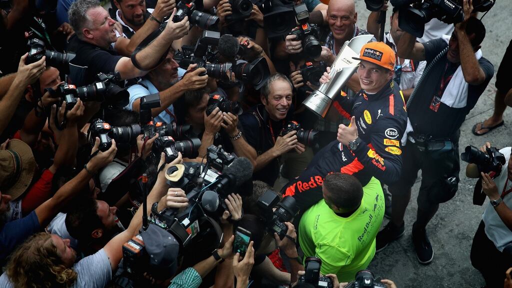Race winner Max Verstappen celebrates with his team after the Malaysia Grand Prix. Photograph: Clive Mason/Getty Images