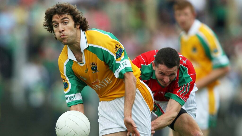 Leitrim’s Colin Regan gathers posession ahead of Mayo’s Peadar Gardiner during a Connacht Championship game in 2006. Photo: Tom Honan/Inpho
