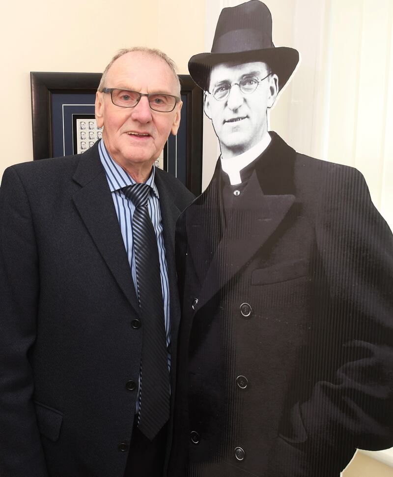 Family Resemblance, Gerry Flanagan, with a cut out of his relation Fr. Flanagan at Celebrations in Ballymoe on Sunday afternoon. Photograph. Mick McCormack