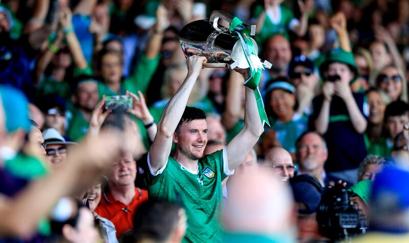 Limerick's Declan Hannon lifts the trophy after Clare had been defeated in the Munster GAA Senior Hurling Championship Final, at the TUS Gaelic Grounds in Co Limerick. Photograph: Evan Treacy/Inpho
