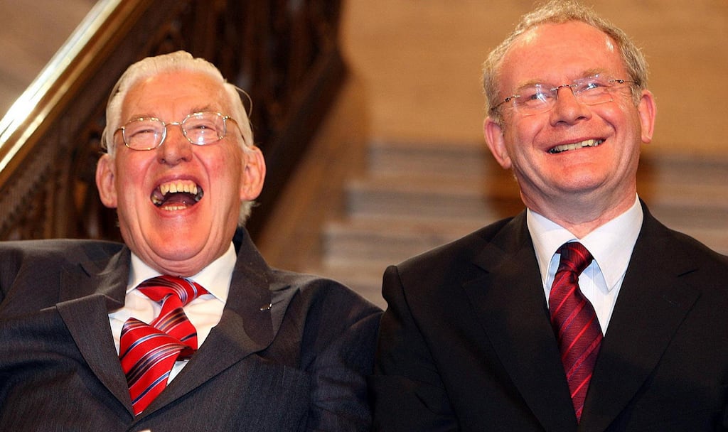 First Minister Ian Paisley and Deputy First Minister Martin McGuinness smiling after being sworn in as Ministers of the Northern Ireland Assembly, Stormont, in May 2007. Photograph: Paul Faith