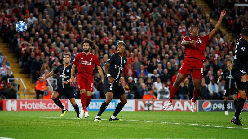 Liverpool’s Daniel Sturridge scores their first goal during the Champions League Group C game against Paris St Germain at Anfield. Photograph: Phil Noble/Reuters