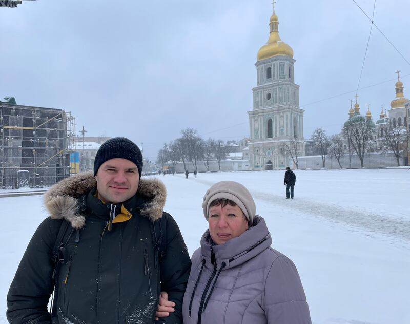 Mother and son Tetyana and Dima Tertychniy played down the impact of power cuts in Ukraine as they took a walk past the 1,000-year-old St Sophia's cathedral in Kyiv. Photograph: Daniel McLaughlin