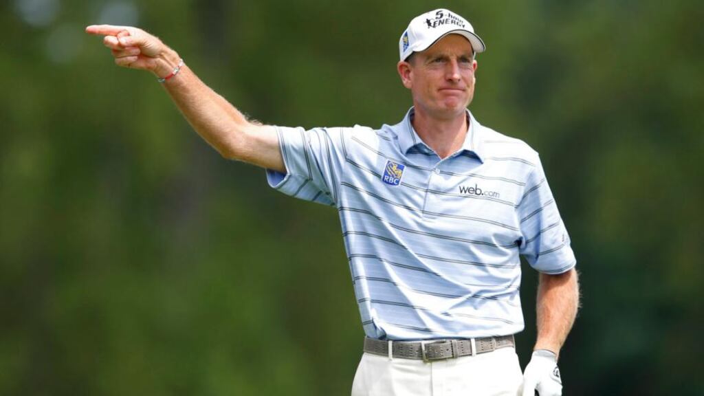 Jim Furyk points after his errant tee shot on the ninth hole during the first round of the 2013 PGA Championship at Oak Hill Country Club in Rochester, New York. Photograph: Jeff Haynes/Reuters