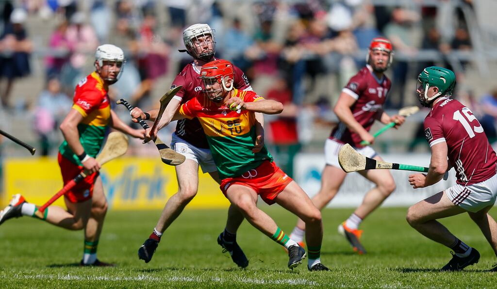Carlow’s Niall Bolger with Galway's Donal O'Shea in their Leinster senior championship game at Pearse Stadium, Co Galway. Photograph: Ashley Cahill/Inpho