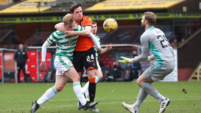 Stephen Welsh is tackled Lawrence Shanklan. Photo: Ian MacNicol/Getty Images