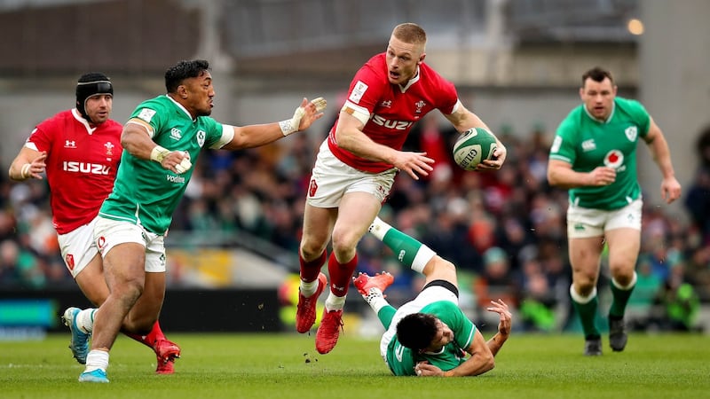 Bundee Aki moves to tackle Wales’ Johnny McNicholl during the Six Nations match at the Aviva stadium. Photograph: Ryan Byrne/Inpho