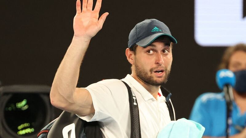 Qualifier Aslan Karatsev leaves the court after losing to Novak Djokovic. Photograph: David Gray/Getty/AFP