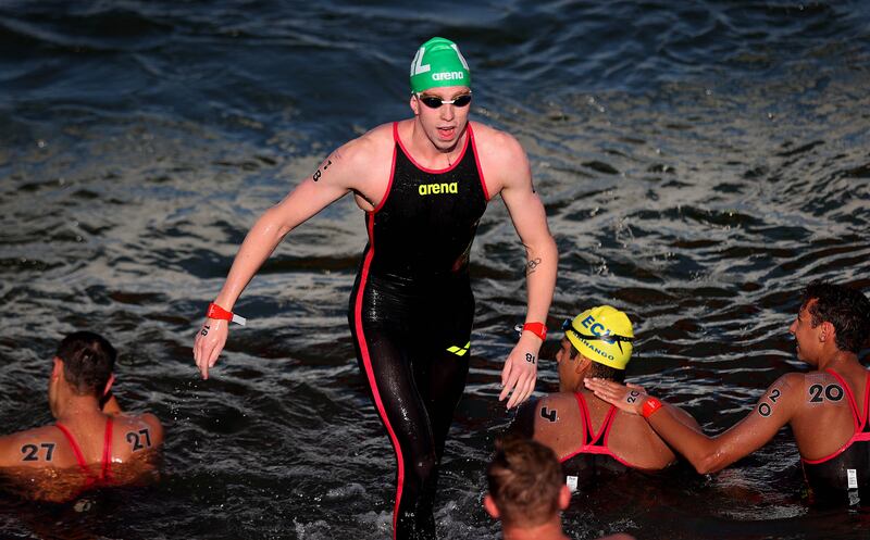 Ireland’s Daniel Wiffen emerges from the water after finishing 18th in the 10km race. Photograph: Ryan Byrne/Inpho